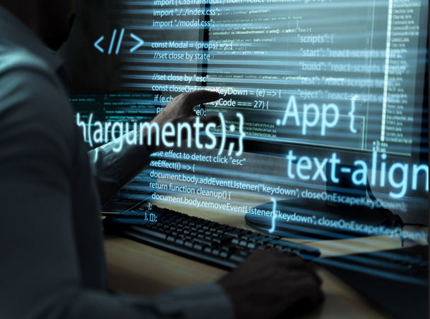 TechDogs-"An Image Of A Man Working On Code On A Computer Screen" TechDogs-"An Image Of A Man Working On Code On A Computer Screen"